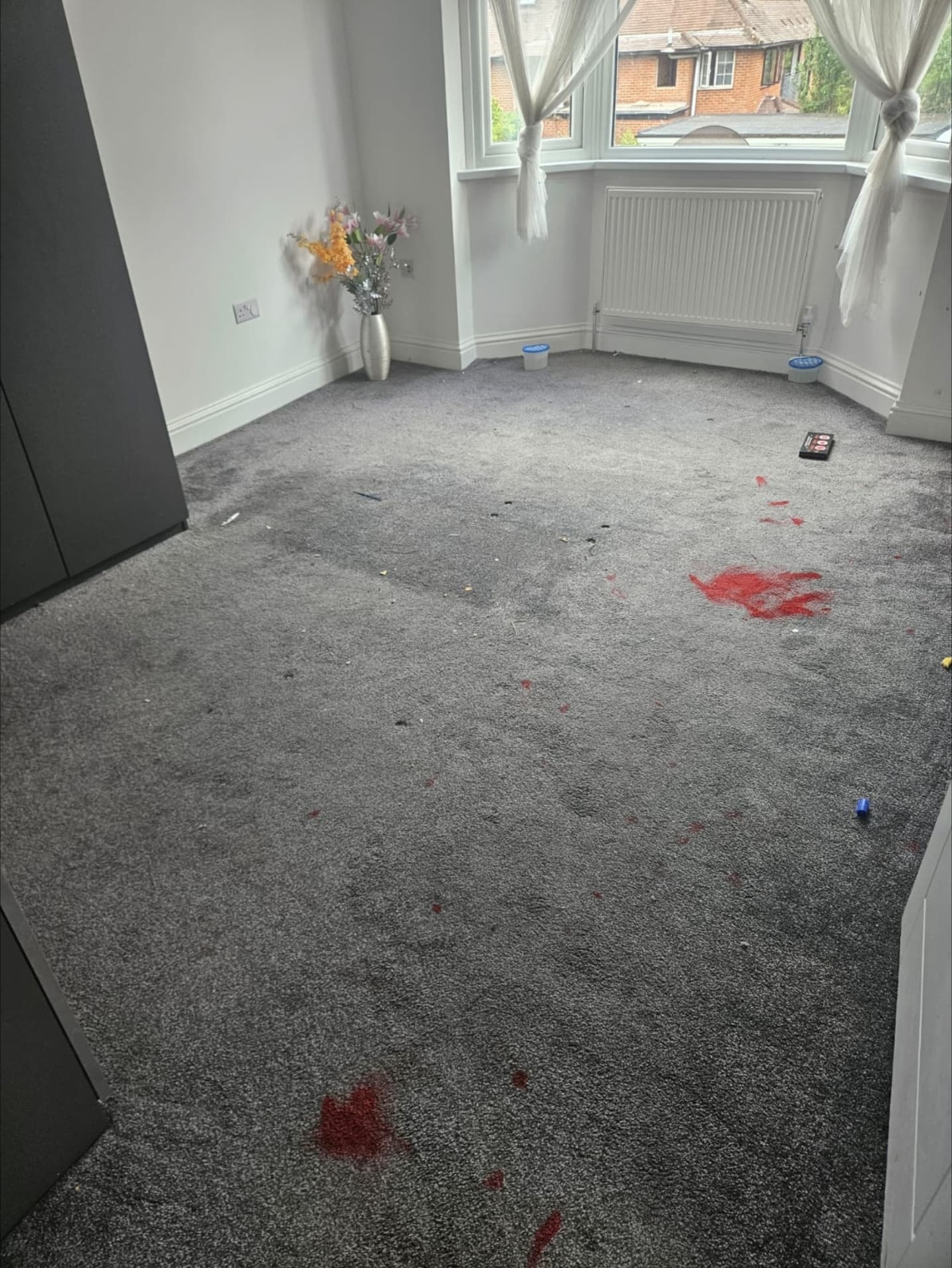 Stained bedroom carpet before cleaning